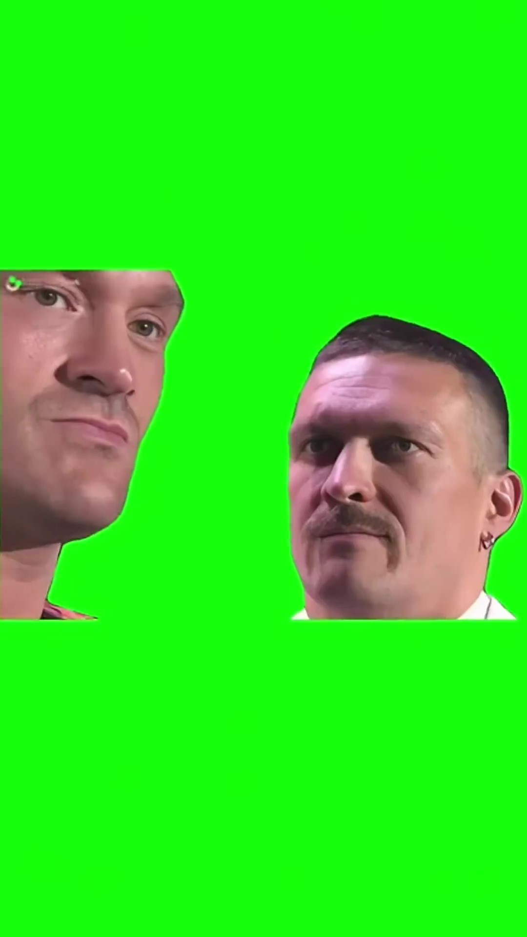 Usyk loking at Fury green screen